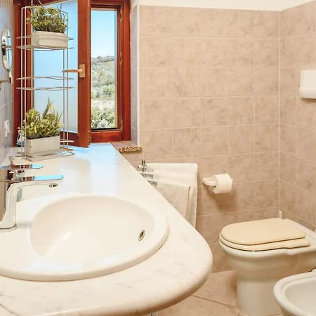 Dom wakacyjny Esclusiva Con Giardino, Paradiso Terrestre San Teodoro (Sardinia)